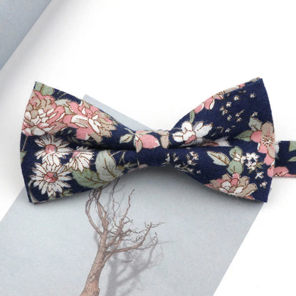 Family matching bow tie set sizes for kids adults and pets flat lay