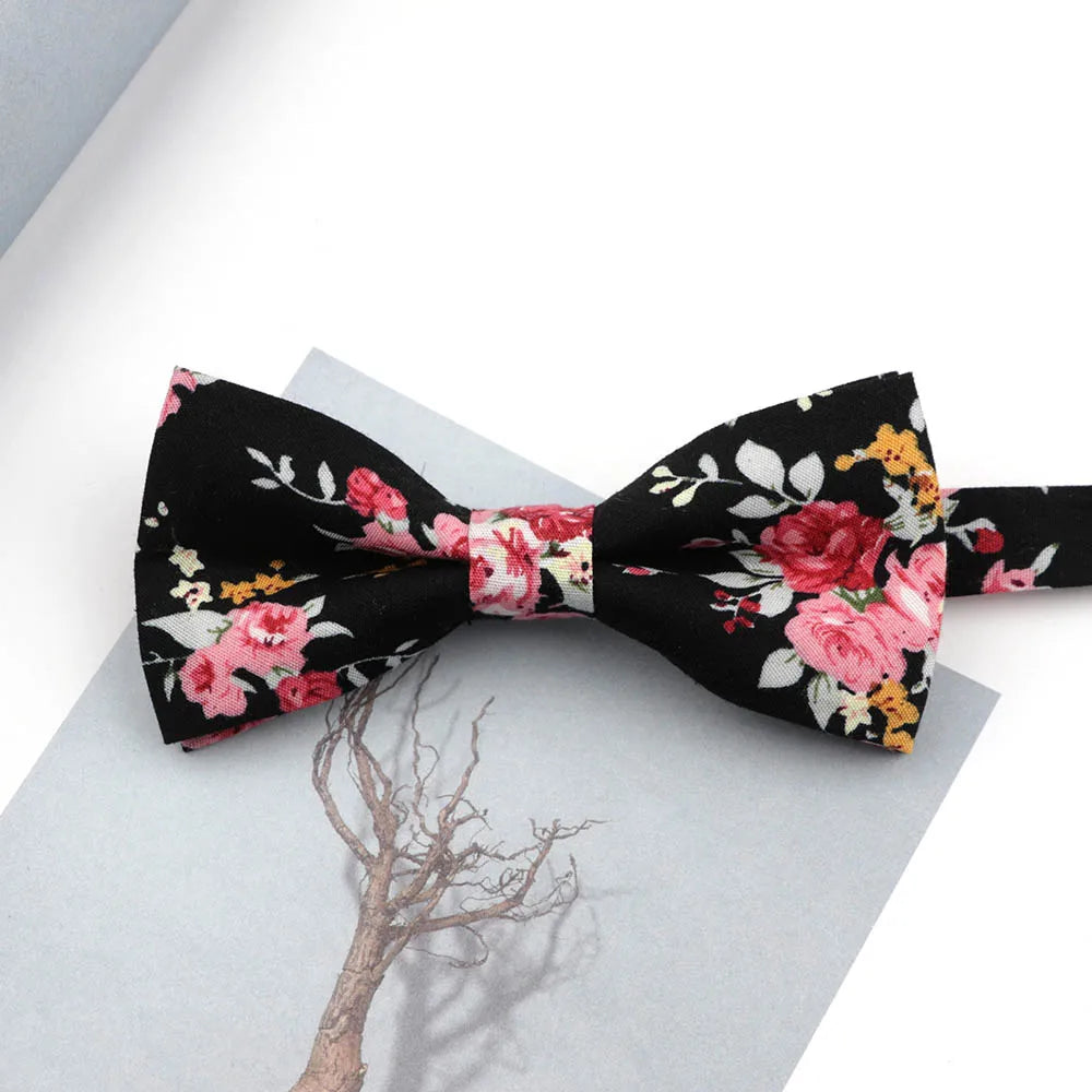 Family matching bow tie set sizes for kids adults and pets flat lay