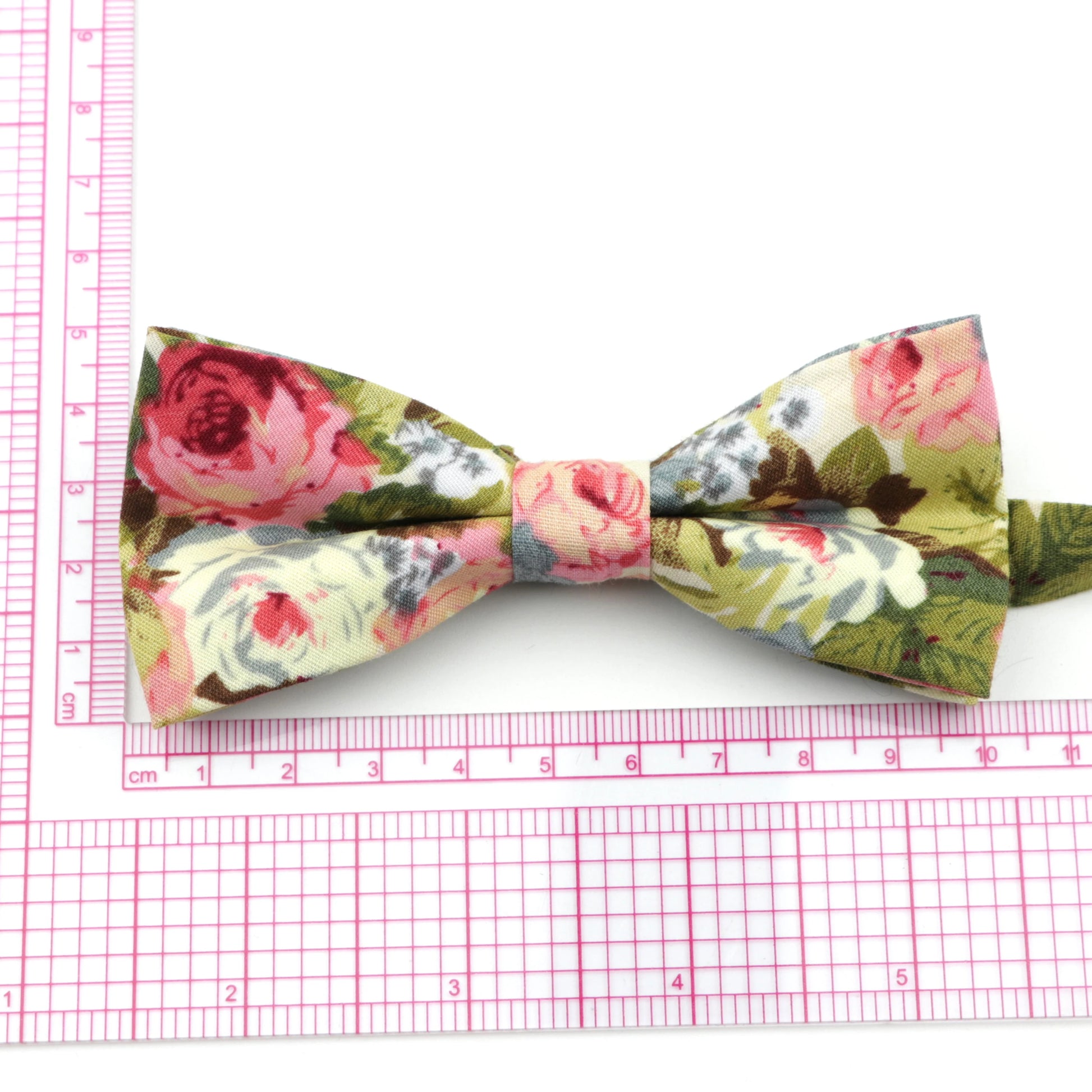 Family matching bow tie set sizes for kids adults and pets flat lay