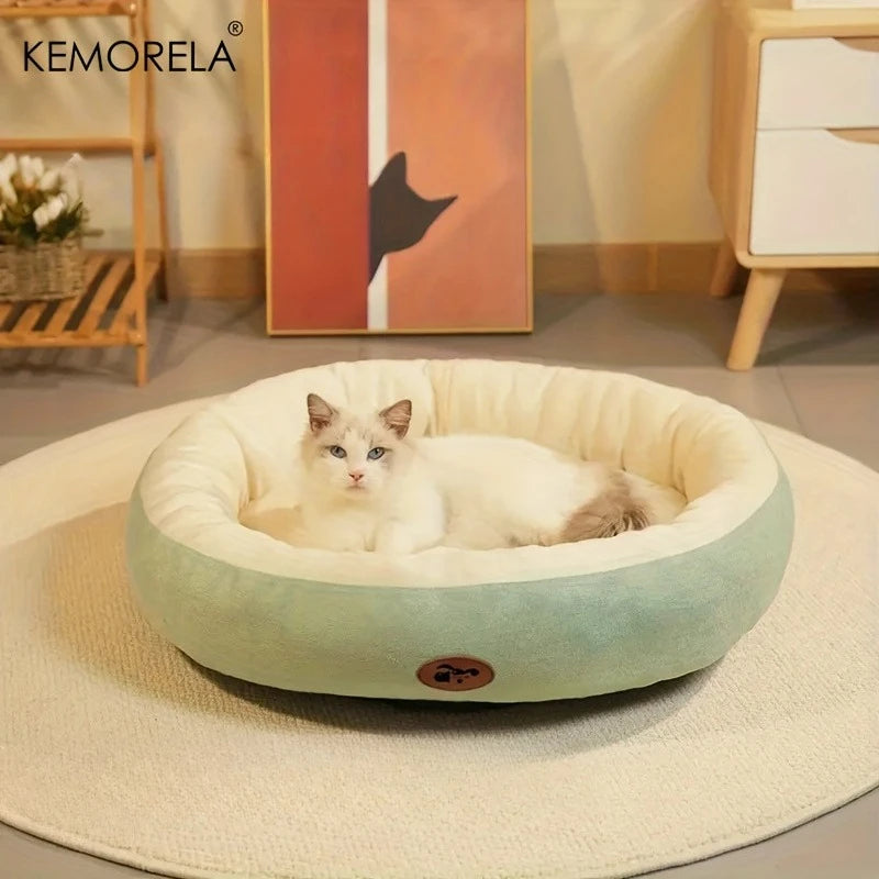 Orthopedic oval pet bed calming all sizes pink green flat lay