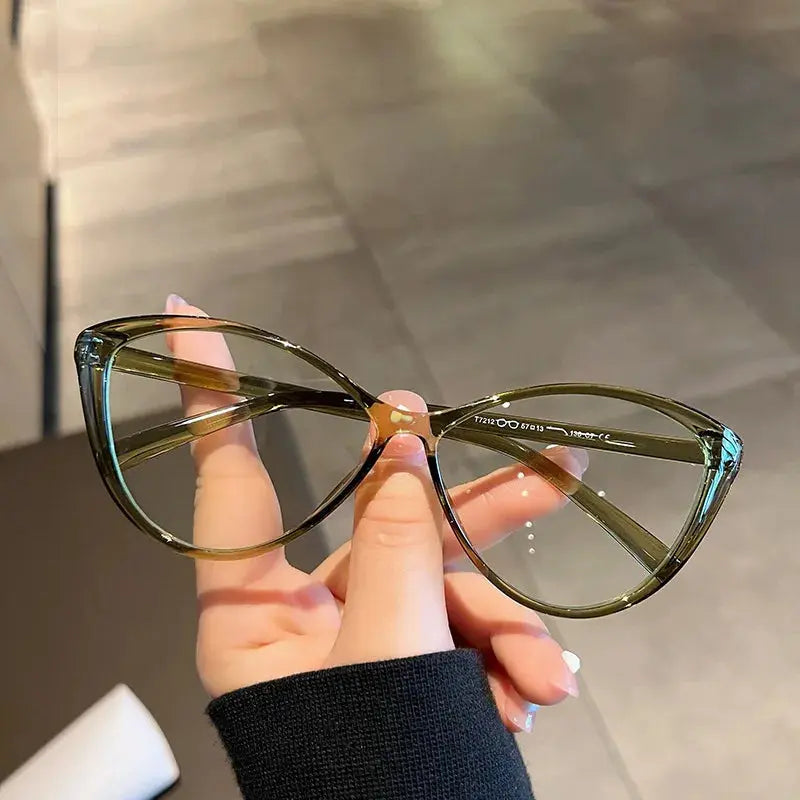 Cat eye anti radiation glasses green lens worn by woman