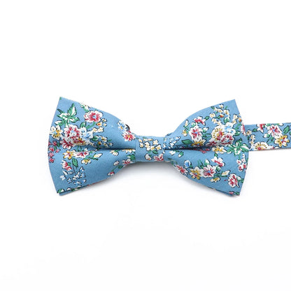 Family matching bow tie set sizes for kids adults and pets flat lay