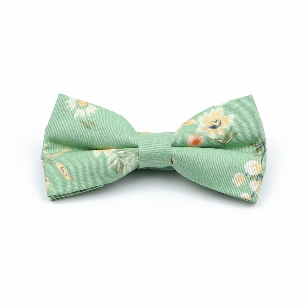 Family matching bow tie set sizes for kids adults and pets flat lay